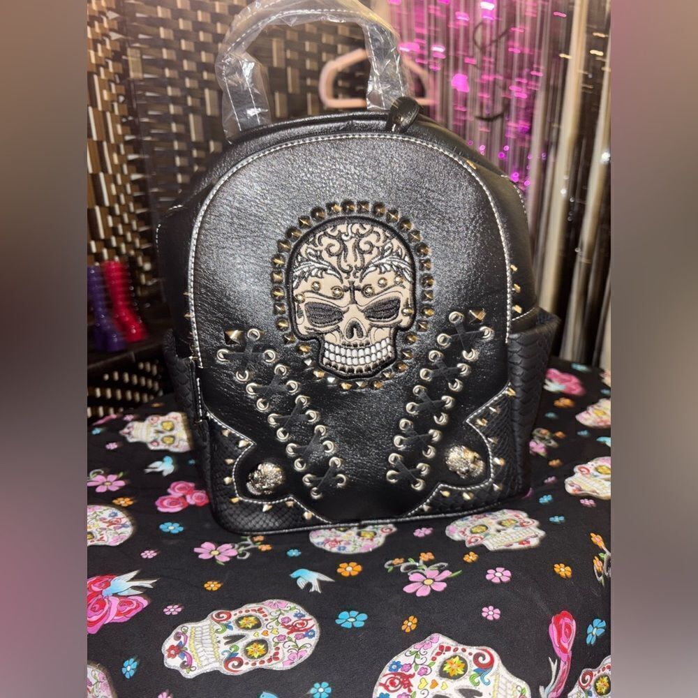 Edgy Backpack with Studded Skull Design